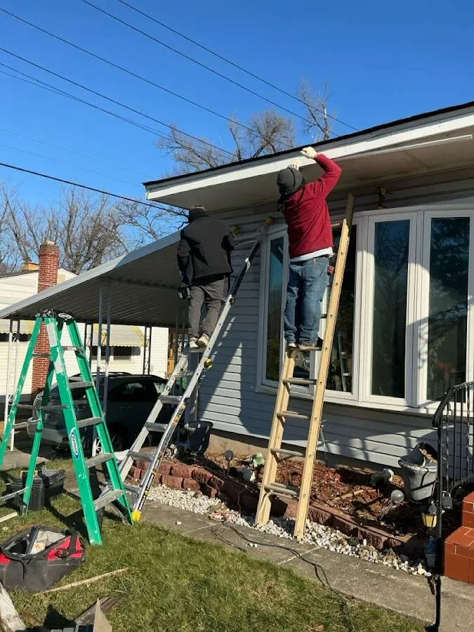 Restoration crew performing exterior repair in Brookhaven